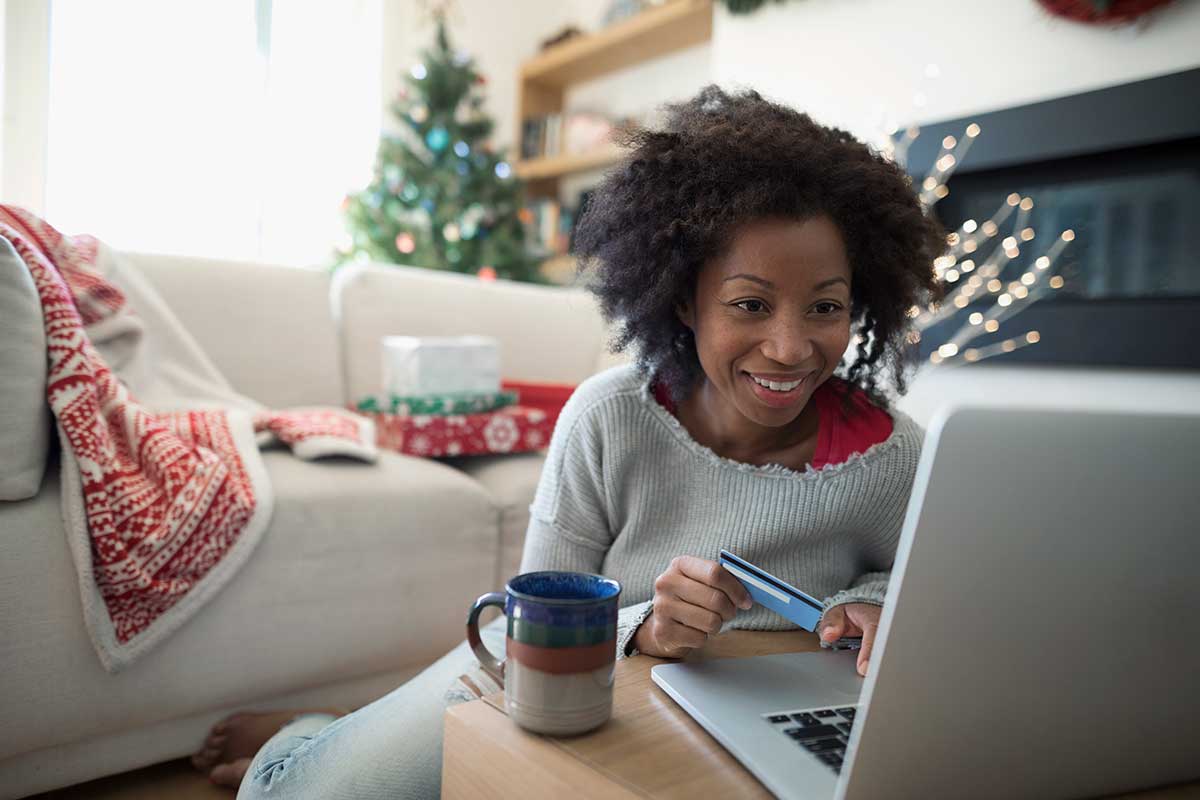 A mother shops for holiday savings online