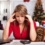 Woman stressed about holiday shopping